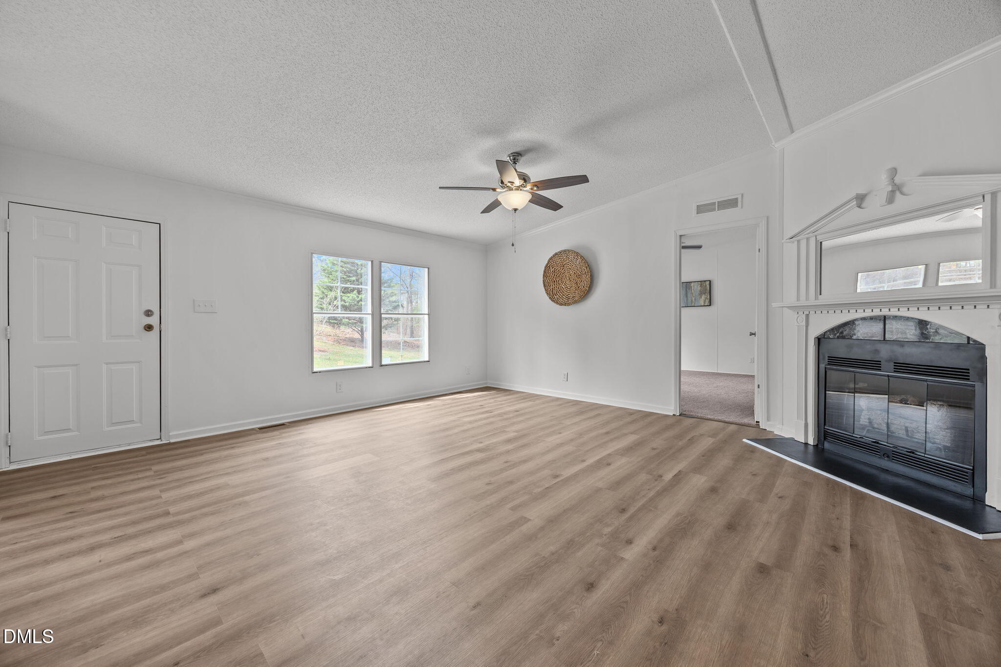35 Athens Court Cameron, NC 28326 - Photo 9 of 44 wooden floor in an empty room with a window