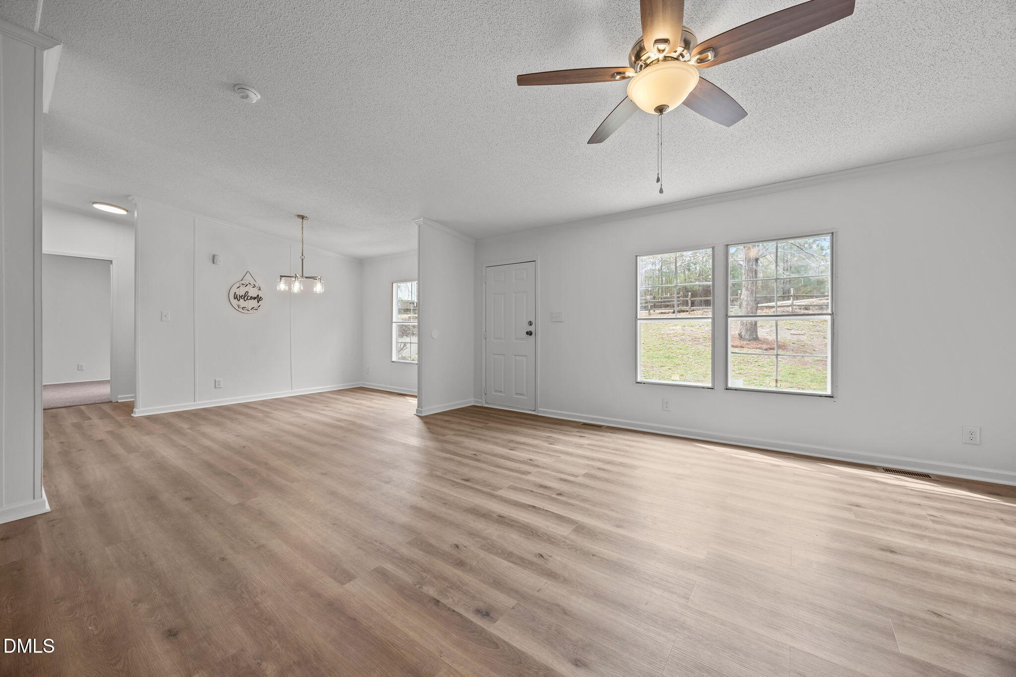 35 Athens Court Cameron, NC 28326 - Photo 10 of 44 wooden floor in an empty room with a window