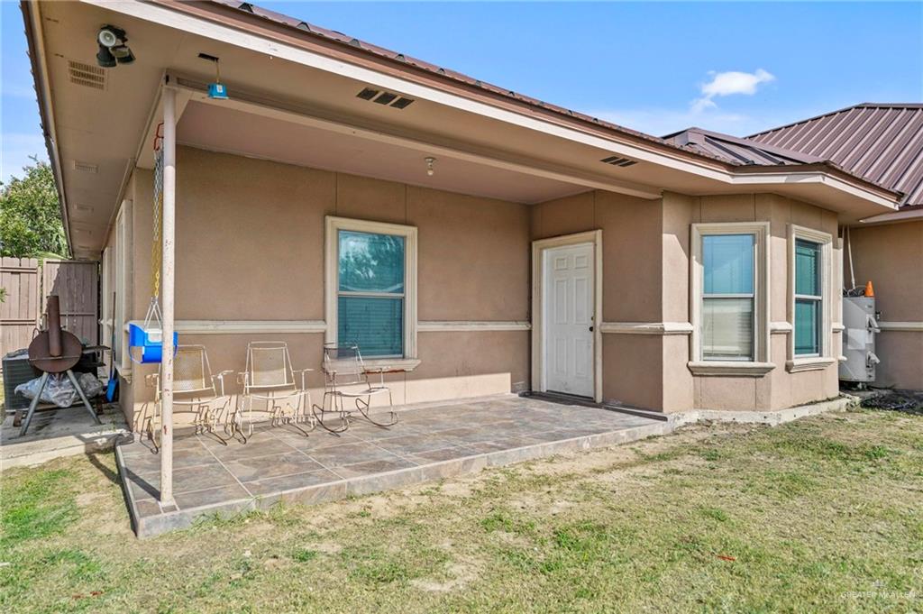 678 La Mesa Street Rio Grande City, TX 78582 - Photo 24 of 35 a view of a house with backyard and sitting area