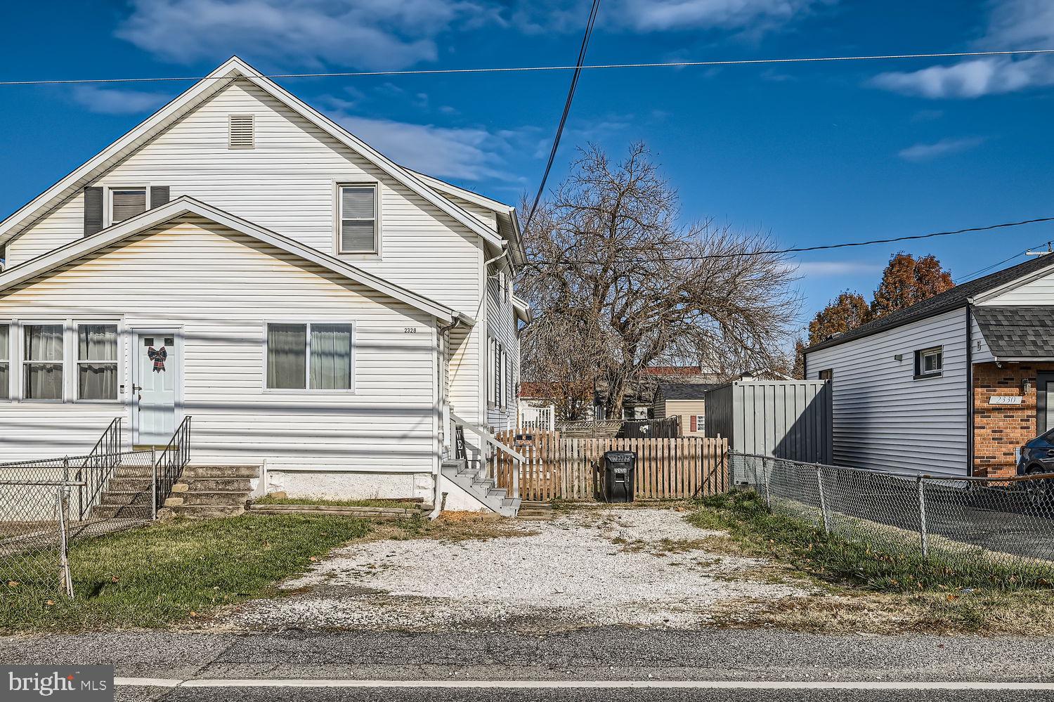 2328 Sparrows Point Road Sparrows Point, MD 21219 - Photo 2 of 28 a view of a house with a yard