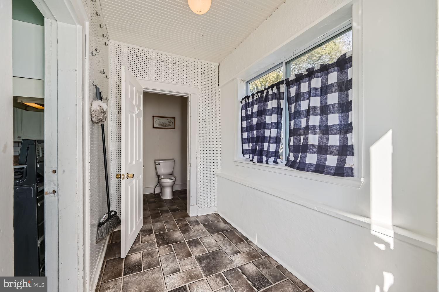 2328 Sparrows Point Road Sparrows Point, MD 21219 - Photo 22 of 28 a view of entryway with bathroom