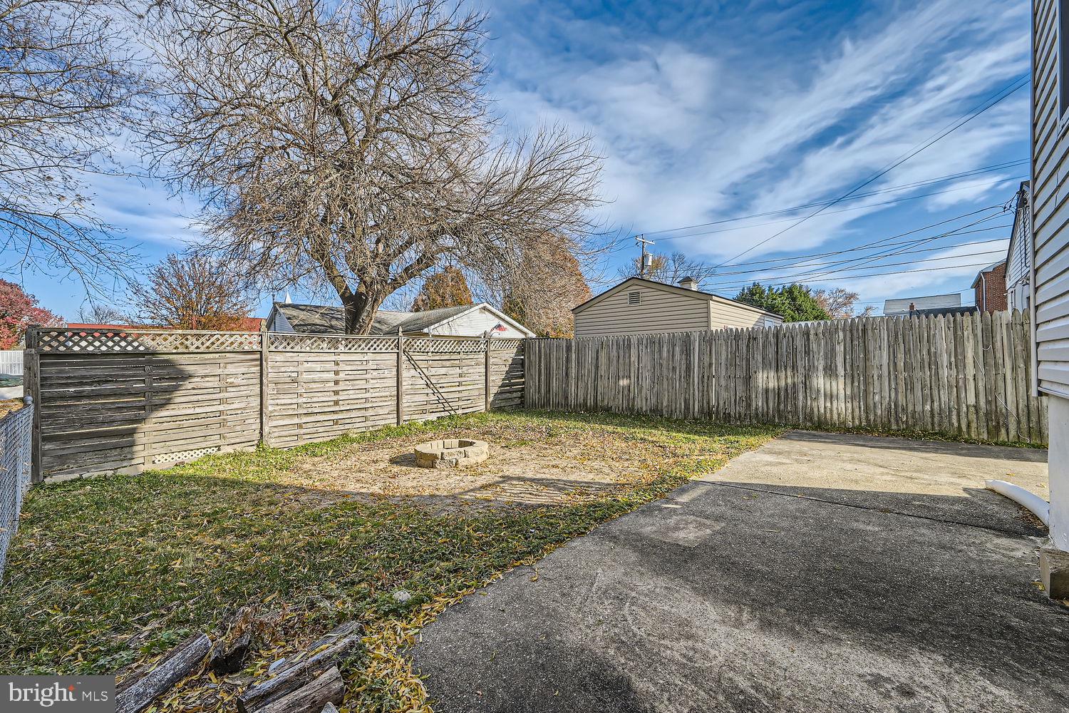 2328 Sparrows Point Road Sparrows Point, MD 21219 - Photo 25 of 28 a backyard of house with wooden fence