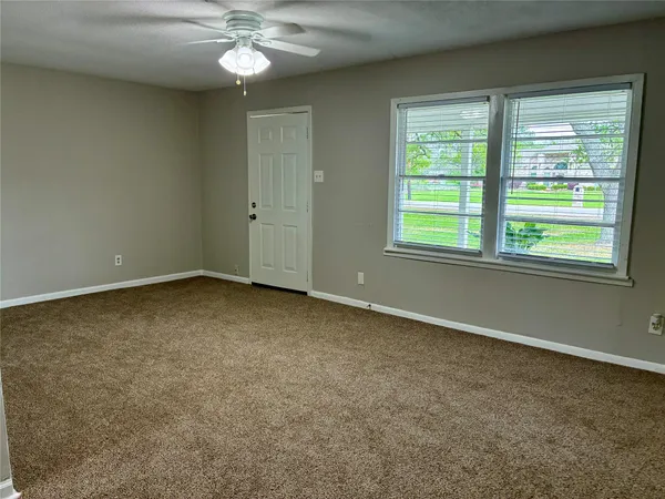 a bathroom with a shower and a toilet