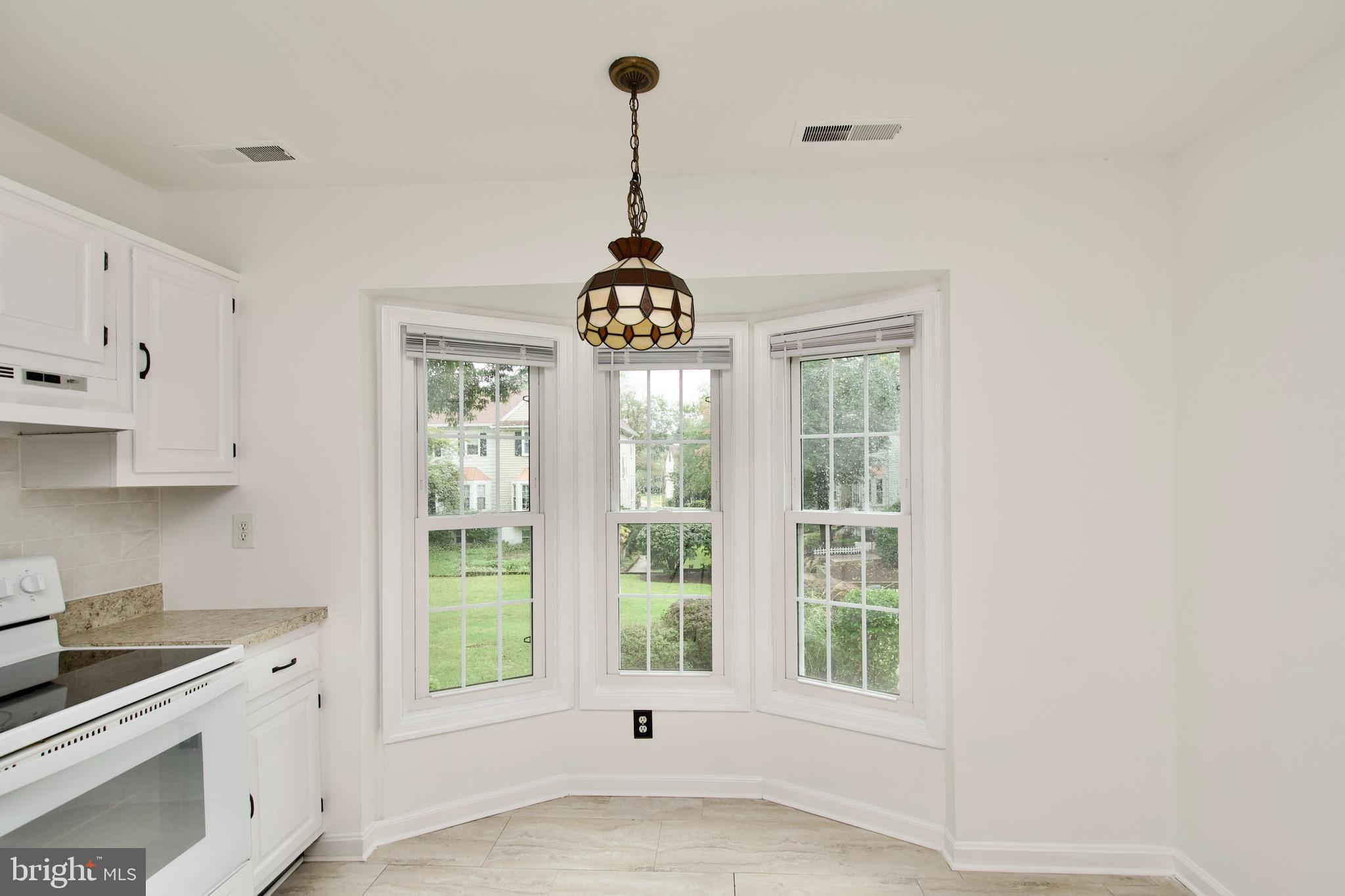 1448 Orleans Court Crofton, MD 21114 - Photo 14 of 33 a view of an empty room with a window