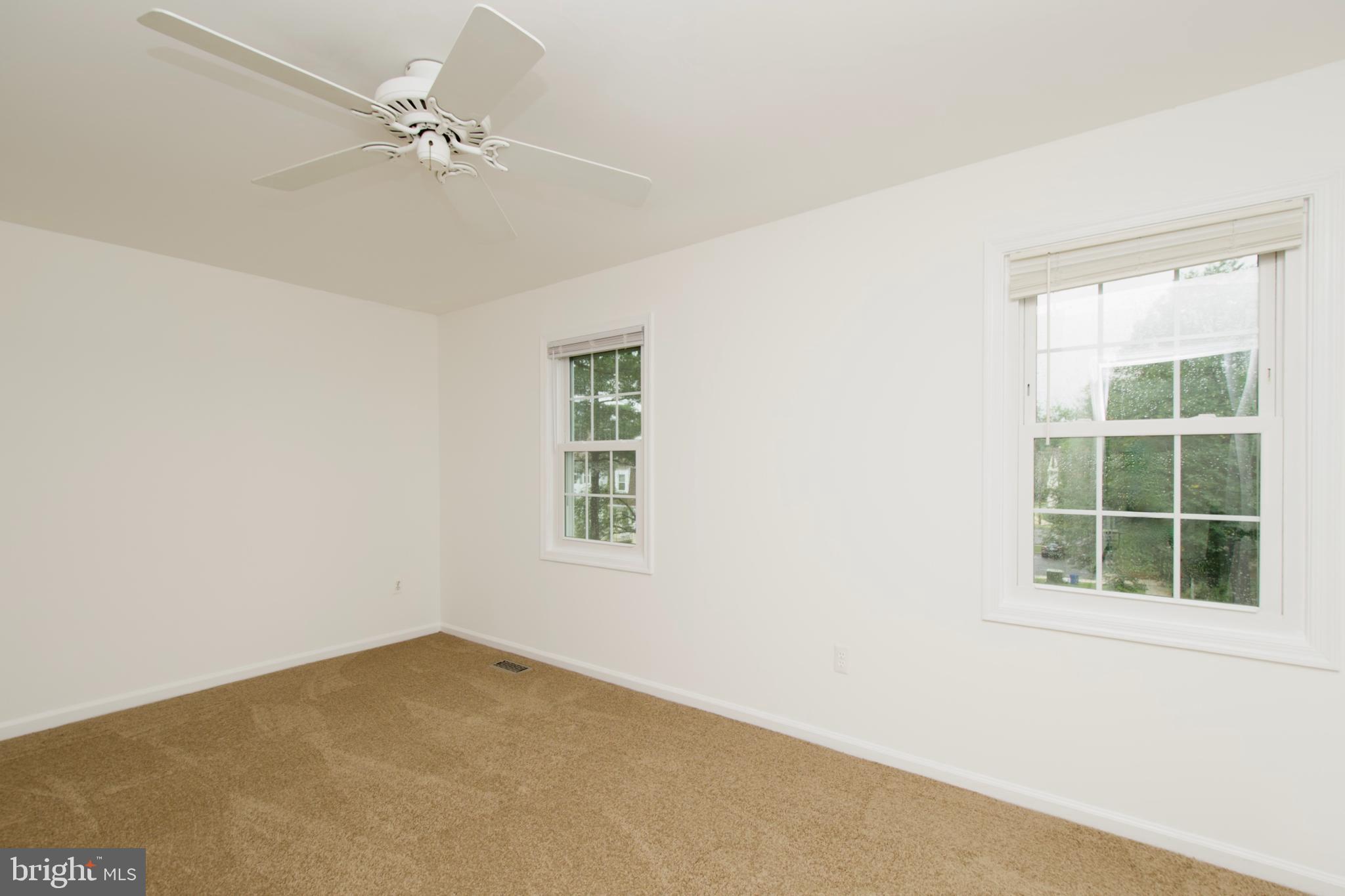 1448 Orleans Court Crofton, MD 21114 - Photo 24 of 33 an empty room with a window