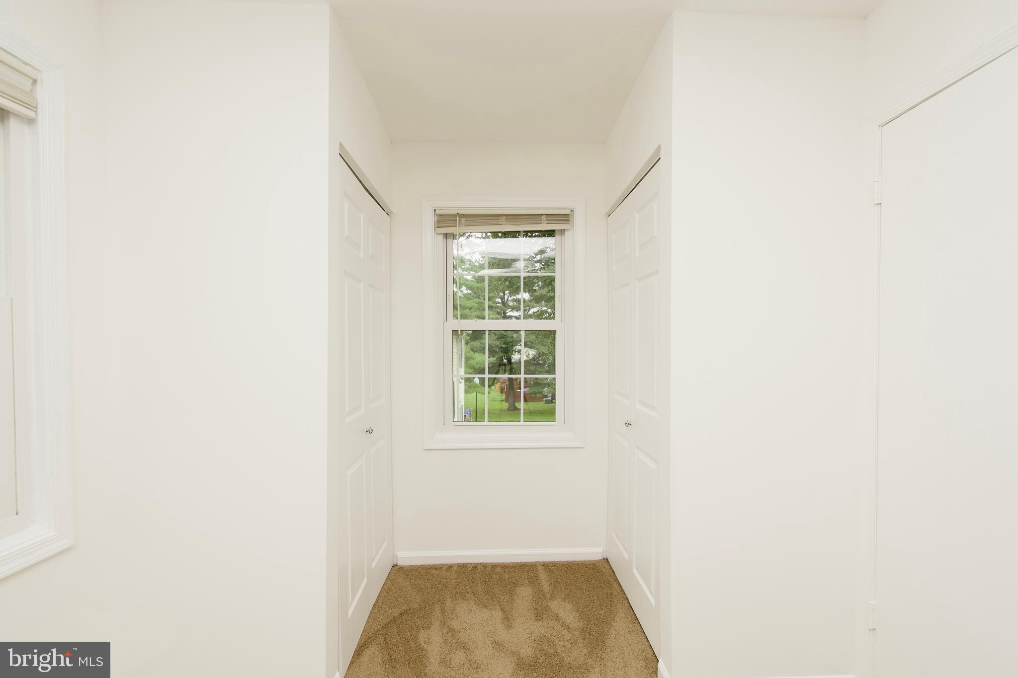 1448 Orleans Court Crofton, MD 21114 - Photo 27 of 33 a view of a room that has a window in it