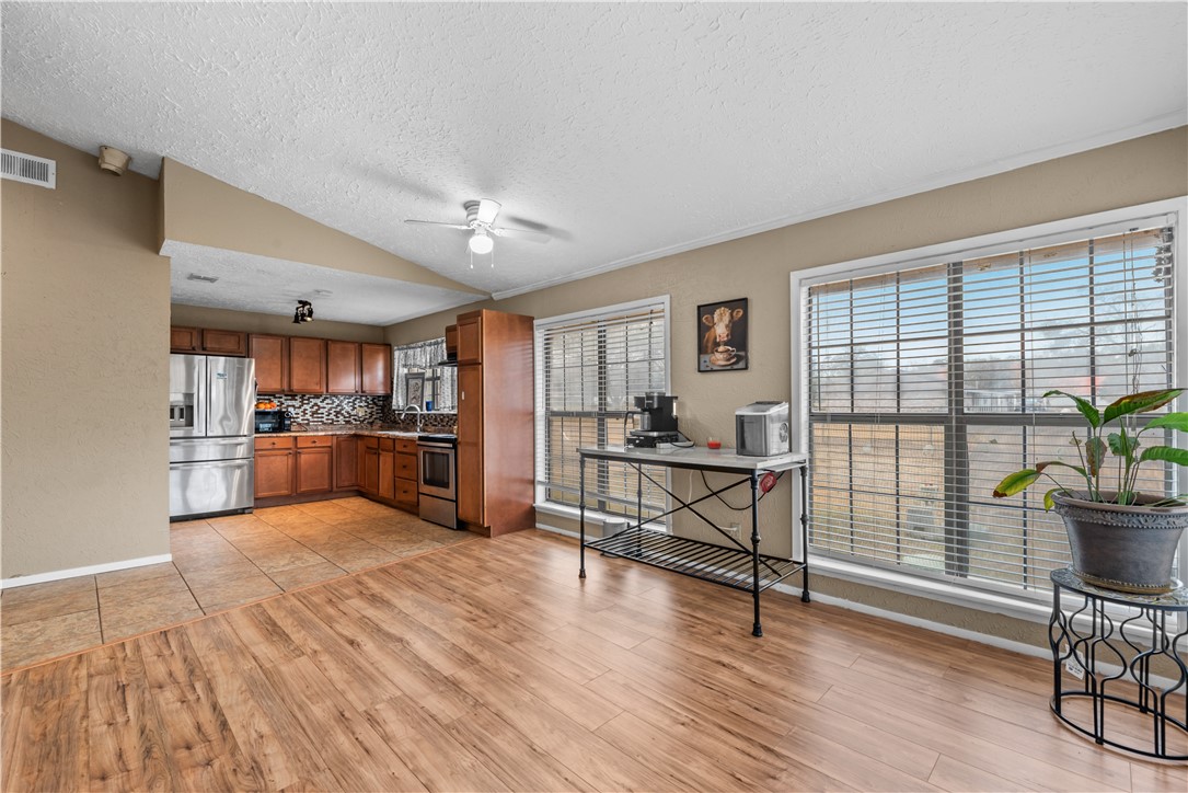 324 Stirrup Road Victoria, TX 77905 - Photo 11 of 40 a view of kitchen with furniture and wooden floor