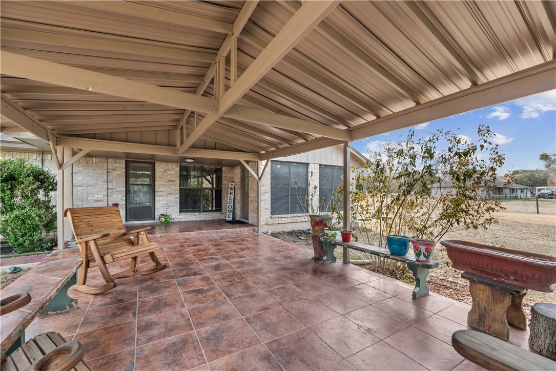 324 Stirrup Road Victoria, TX 77905 - Photo 28 of 40 a view of a porch with furniture and a yard