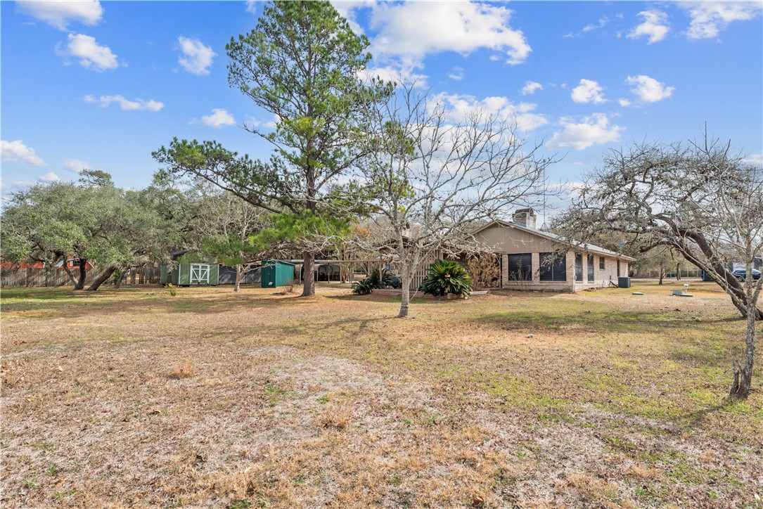 324 Stirrup Road Victoria, TX 77905 - Photo 35 of 40 a view of a yard with a house in the background