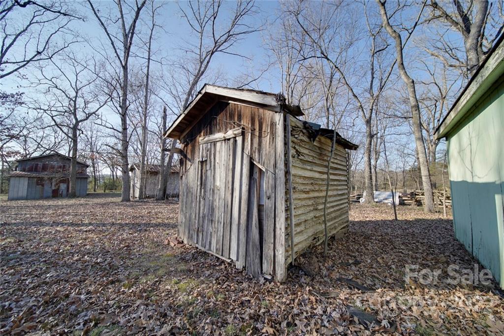 62 Bennett Martin Road Polkton, NC 28135 - Photo 24 of 26 a view of a house with a yard