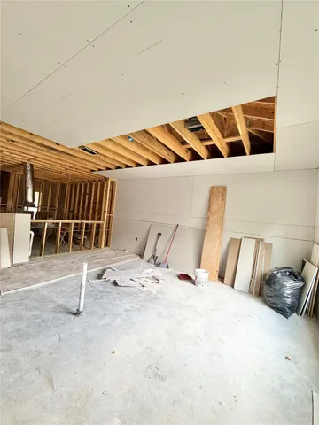 a view of empty room with windows