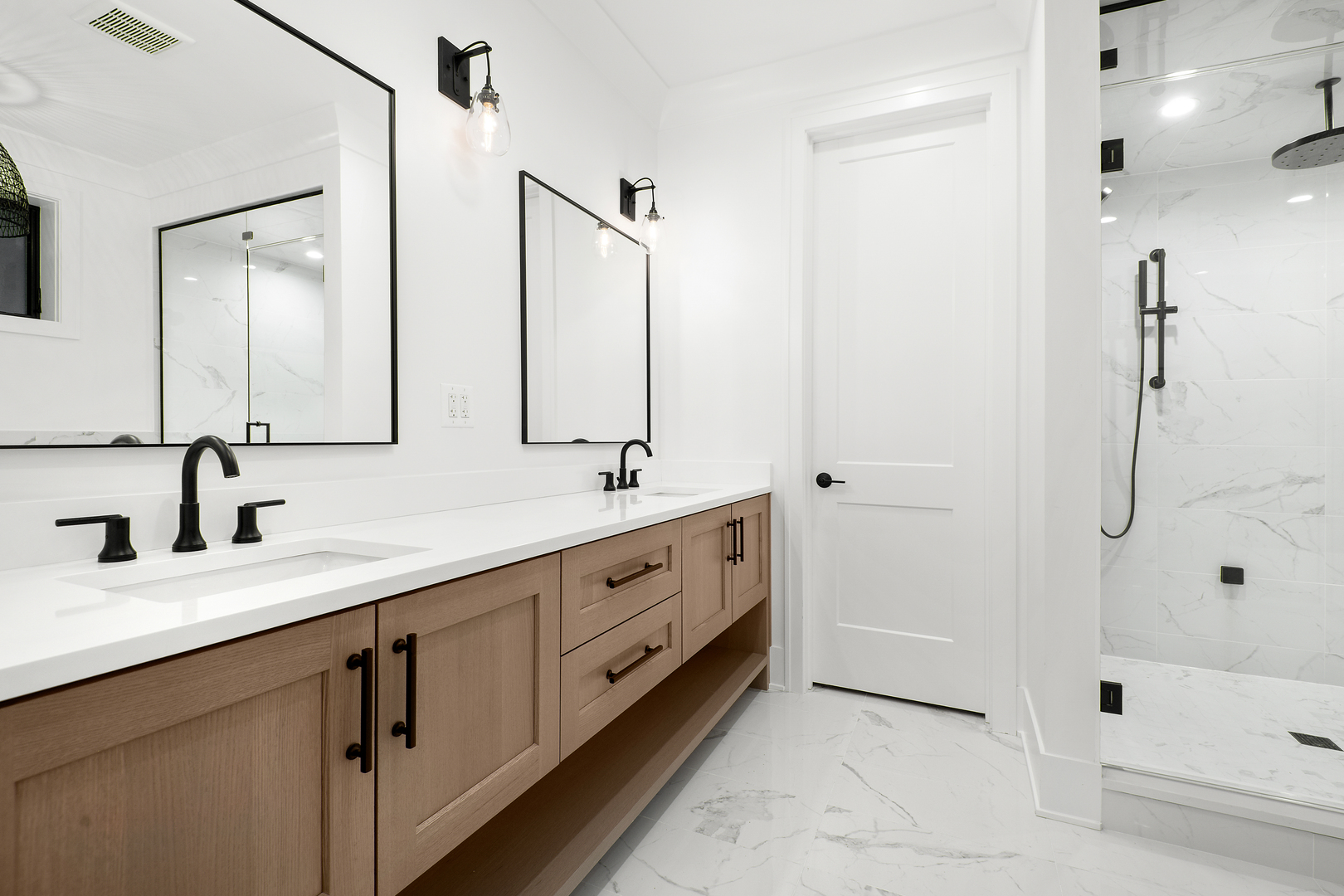 2051 North Racine Avenue, Unit 1 Chicago, IL 60614 - Photo 11 of 21 a bathroom with double sink and a shower