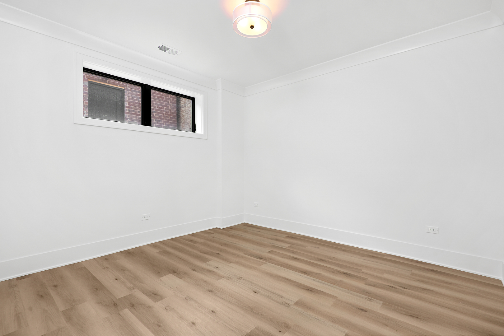 2051 North Racine Avenue, Unit 1 Chicago, IL 60614 - Photo 15 of 21 a view of an empty room