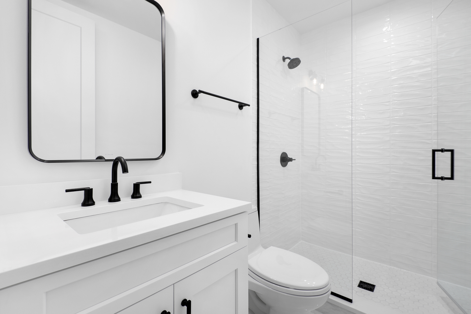 2051 North Racine Avenue, Unit 1 Chicago, IL 60614 - Photo 17 of 21 a bathroom with a sink toilet and shower
