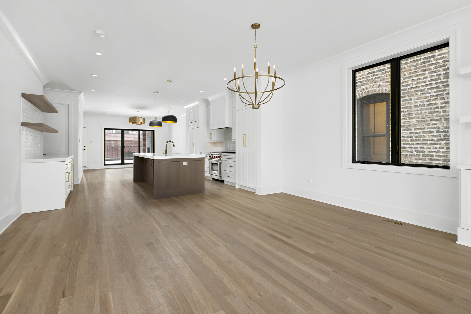 2051 North Racine Avenue, Unit 1 Chicago, IL 60614 - Photo 4 of 21 a view of a kitchen with furniture and wooden floor