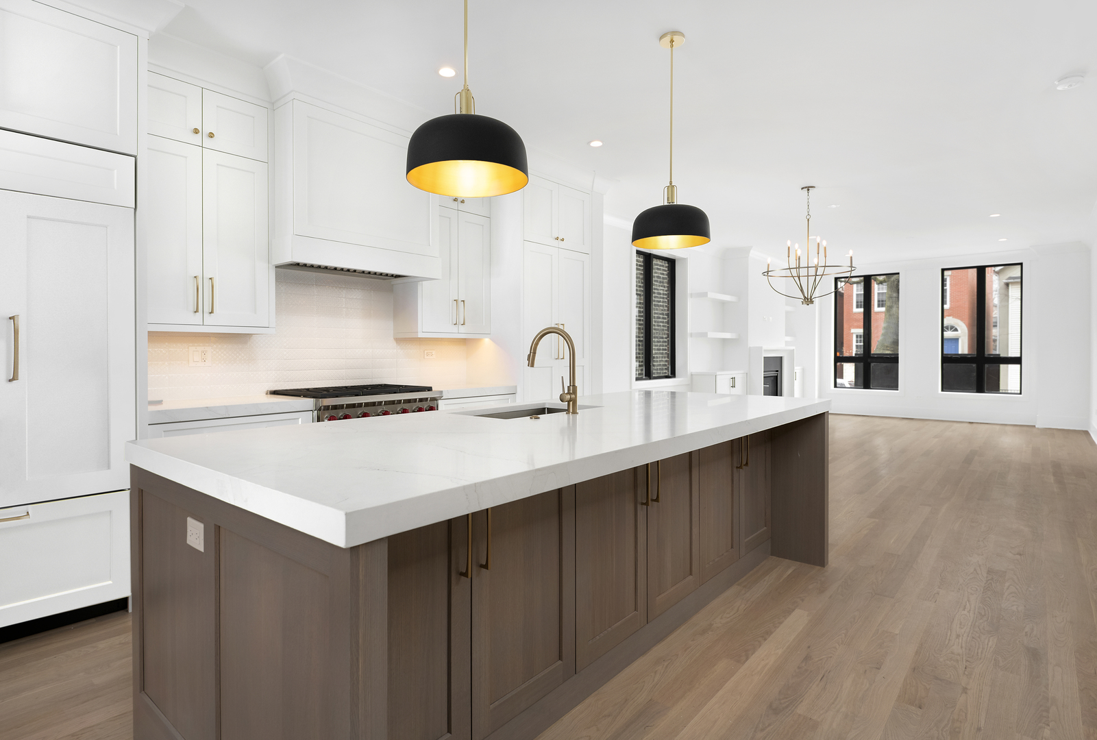 2051 North Racine Avenue, Unit 1 Chicago, IL 60614 - Photo 6 of 21 a kitchen with a sink cabinets and a wooden floor