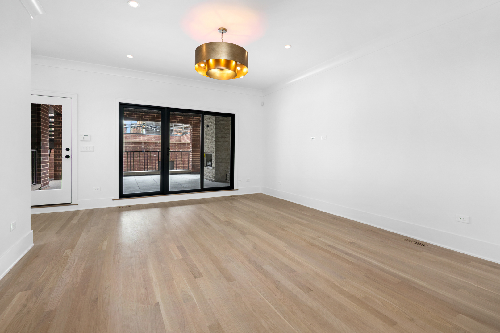 2051 North Racine Avenue, Unit 1 Chicago, IL 60614 - Photo 8 of 21 an empty room with a window