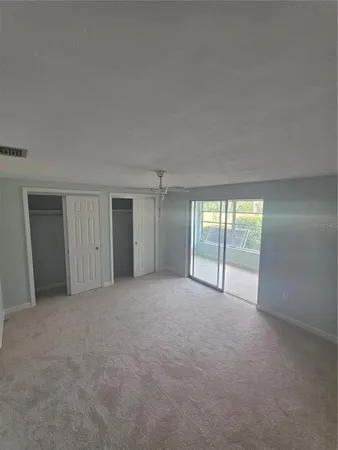 an empty room that has a window