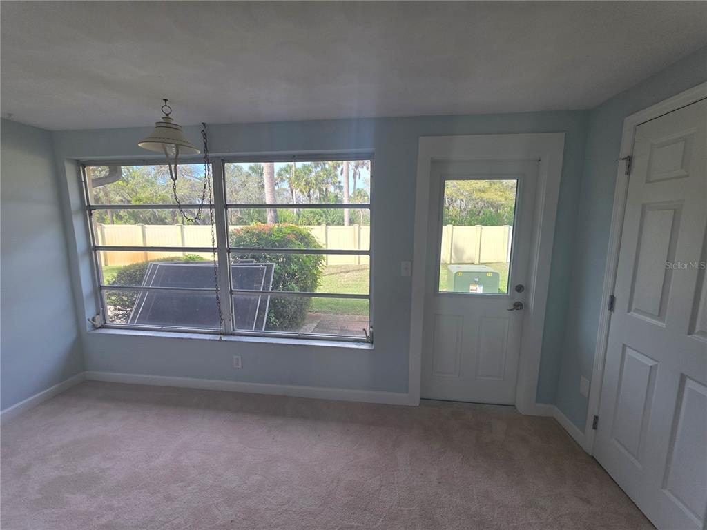 4461 Rustic Drive, Unit 4461 New Port Richey, FL 34652 - Photo 16 of 34 an empty room that has a window