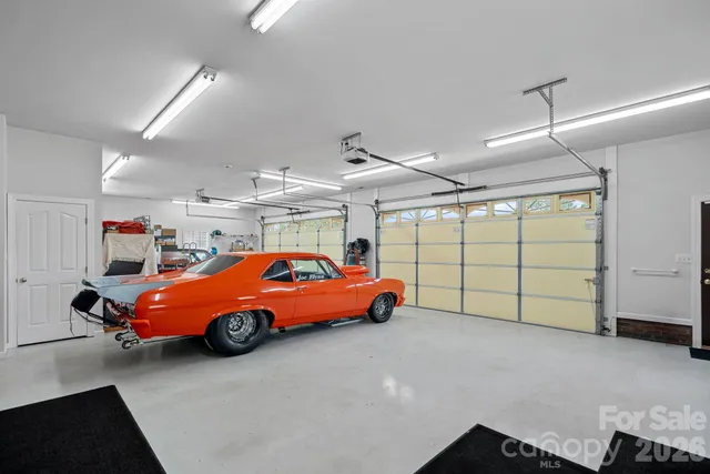 a blue car parked in a garage
