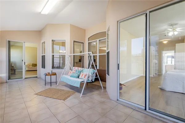a sink with a stove and potted plant