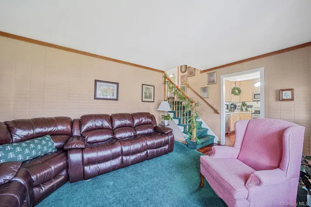 a outdoor living space with furniture and a potted plant