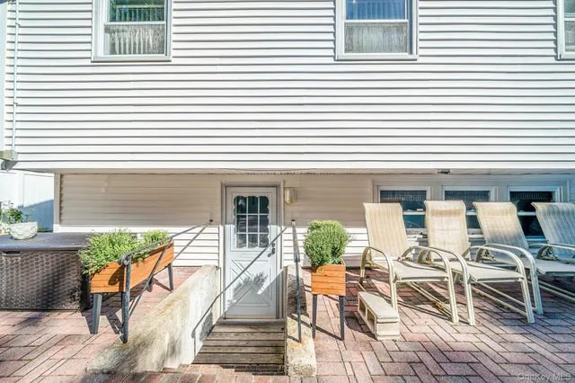 a view of a backyard with a patio
