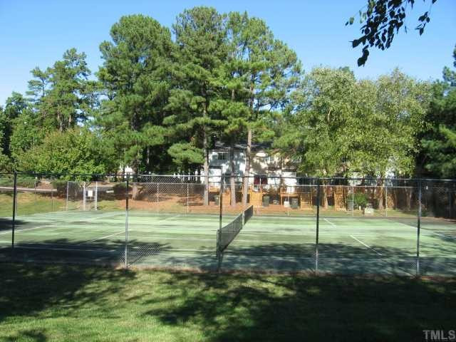 7721 Kingsberry Court Raleigh, NC 27615 - Photo 5 of 11 4 great tennis courts are close to townhome for residence of the neighborhood,