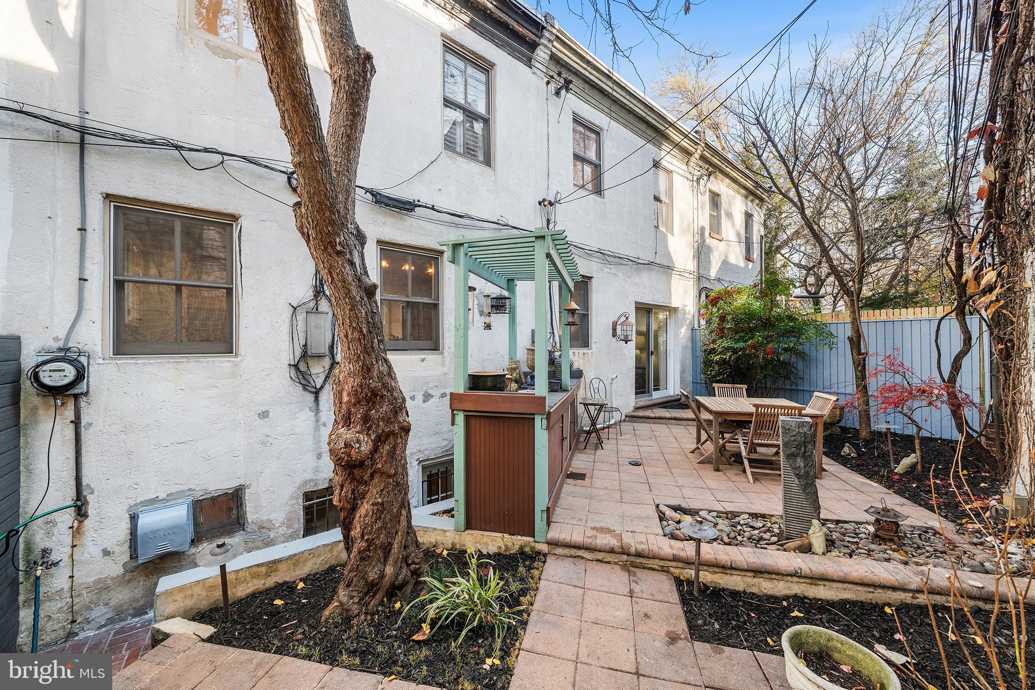 4 Rainey Court Philadelphia, PA 19103 - Photo 19 of 35 Charming outdoor retreat with lush greenery.