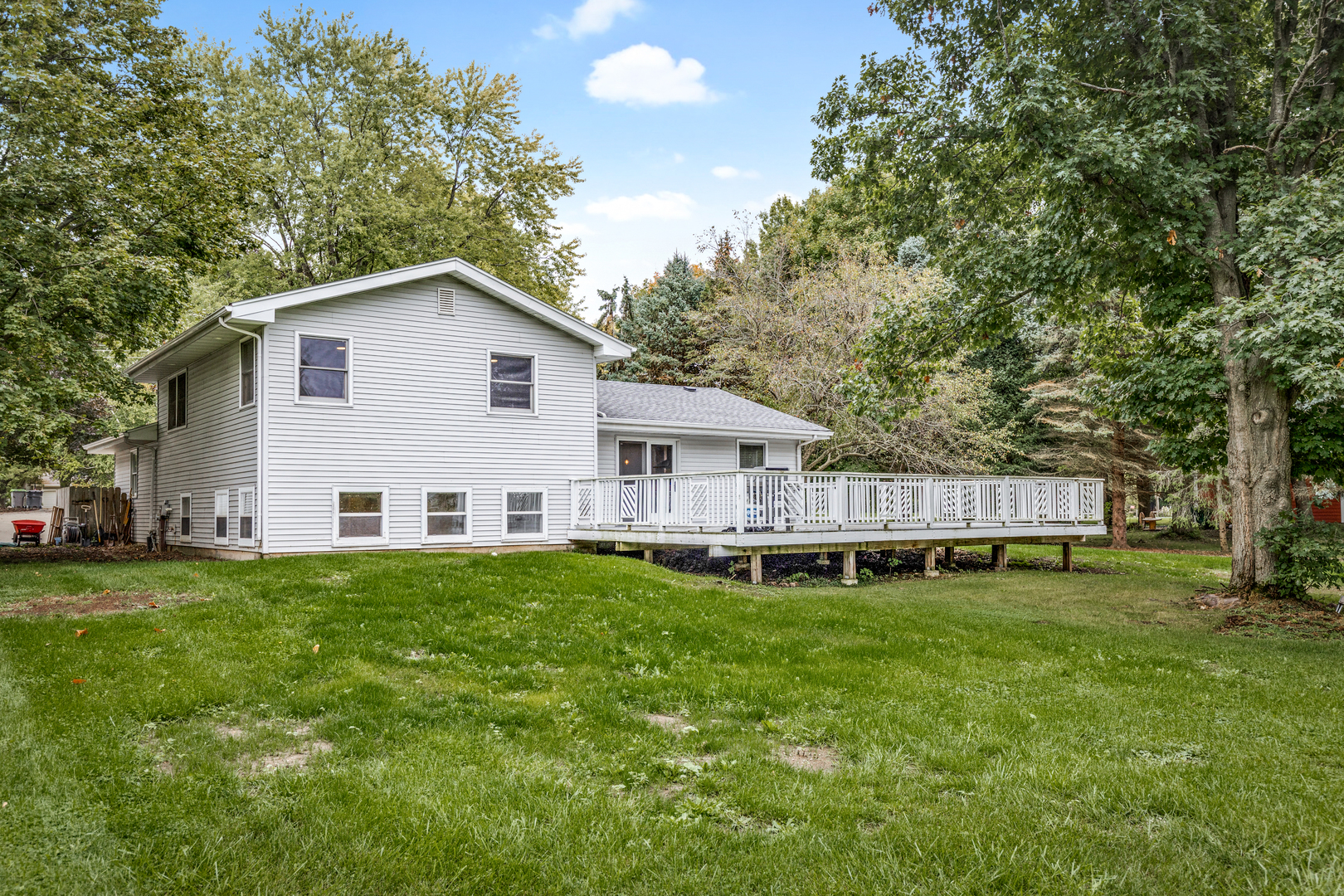 1N136 Pouley Road Elburn, IL 60119 - Photo 22 of 30 a view of a house with a yard and sitting area