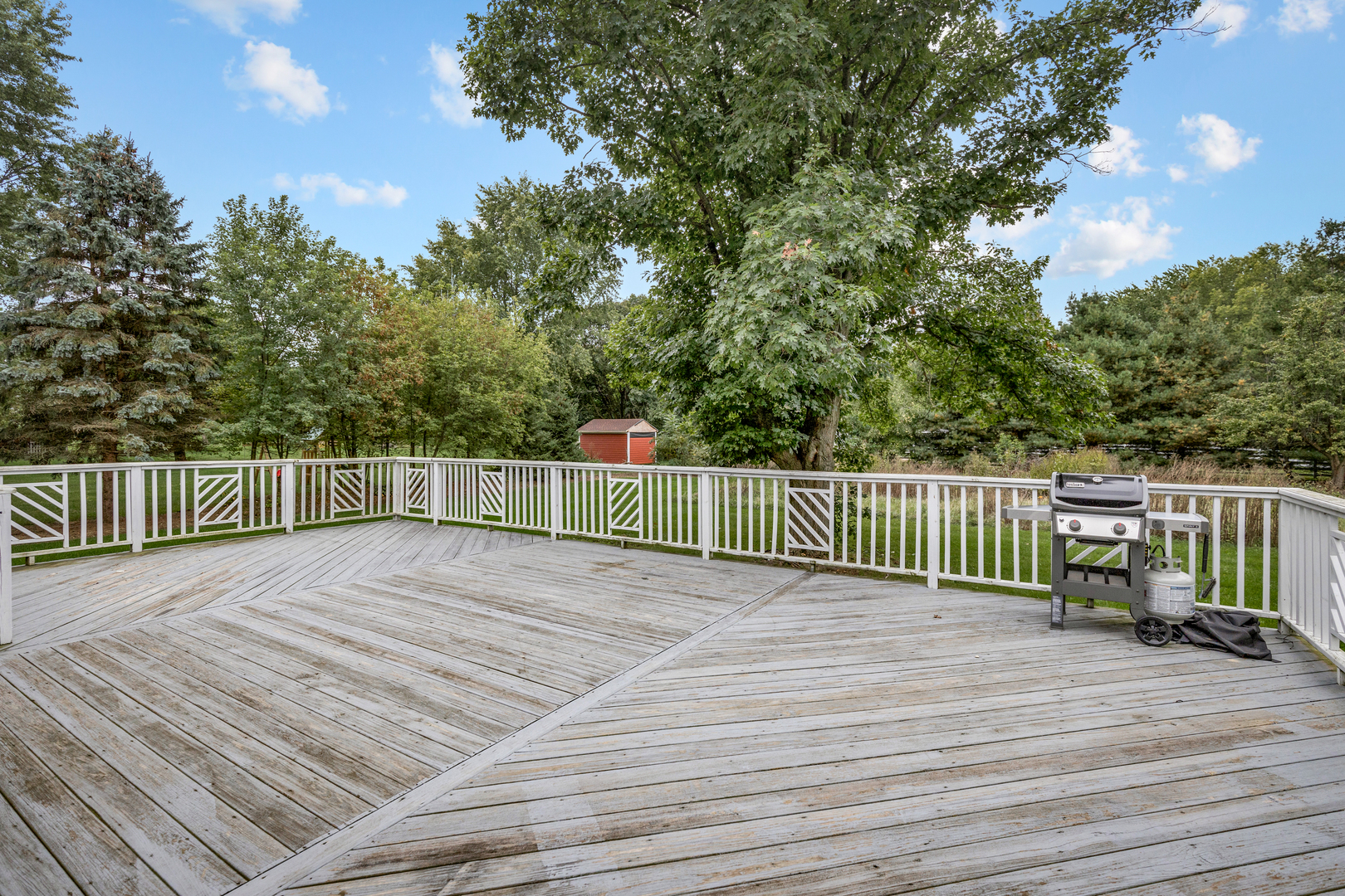 1N136 Pouley Road Elburn, IL 60119 - Photo 23 of 30 a view of a wooden deck