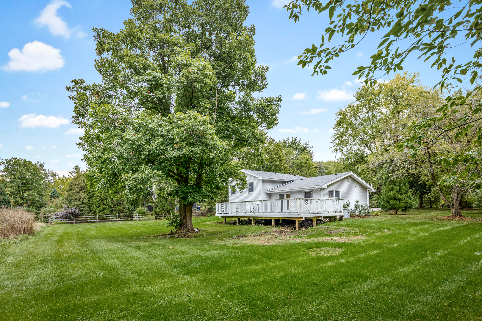 1N136 Pouley Road Elburn, IL 60119 - Photo 24 of 30 a view of a house with a big yard