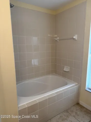 a close up of a bathtub in a bathroom