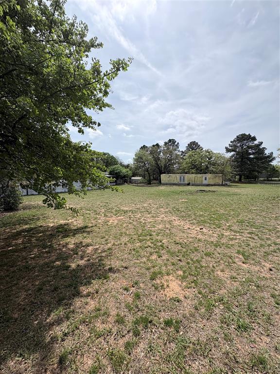 6295 Rendon New Hope Road Fort Worth, TX 76140 - Photo 38 of 38 Expansive open lot featuring mature trees and a clear sky