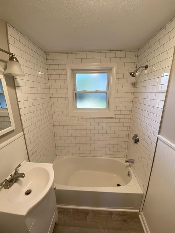 70 Plumtree Circle Springfield, MA 01118 - Photo 11 of 29 a bathroom with a tub and a sink