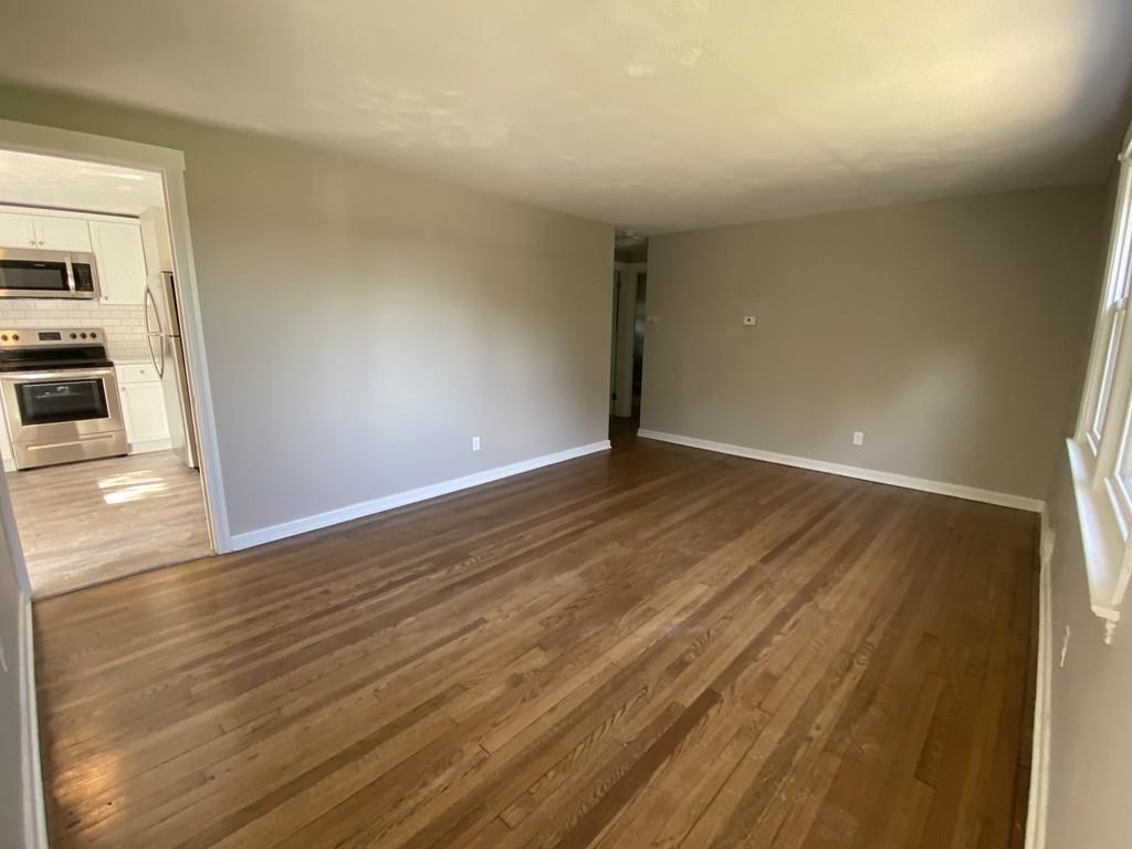 70 Plumtree Circle Springfield, MA 01118 - Photo 15 of 29 a view of an empty room with wooden floor