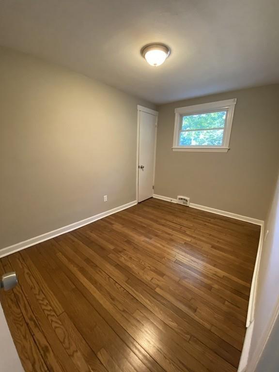 70 Plumtree Circle Springfield, MA 01118 - Photo 16 of 29 a view of empty room with wooden floor