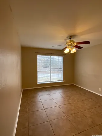 a bathroom with a toilet a sink and shower