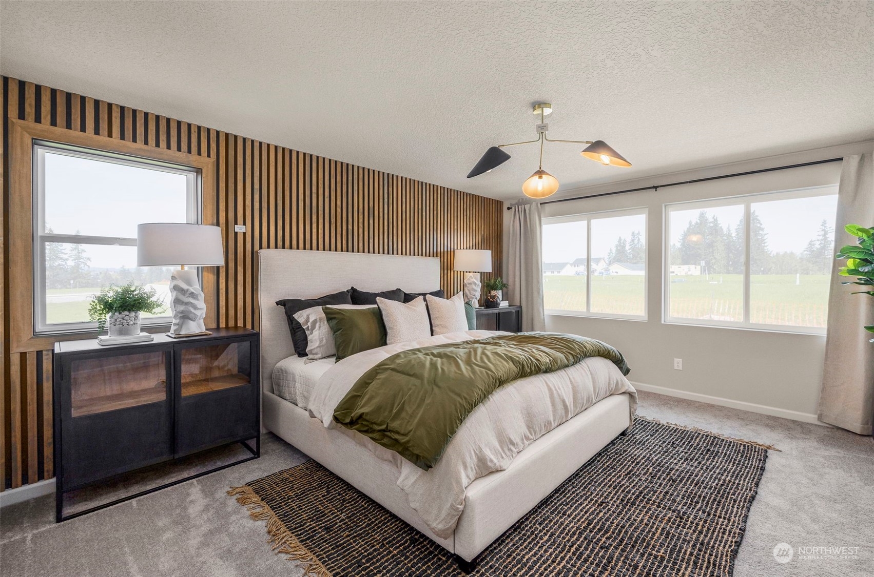 2801 South 7th Circle Ridgefield, WA 98642 - Photo 13 of 27 a bedroom with a large bed and a window
