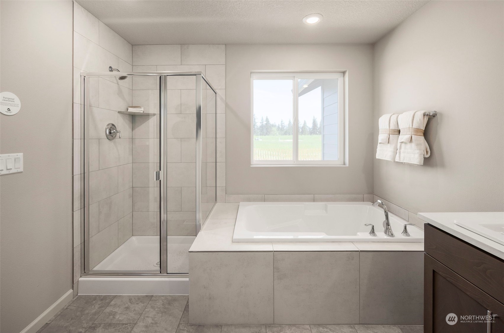 2801 South 7th Circle Ridgefield, WA 98642 - Photo 17 of 27 a bathroom with a bathtub and a shower