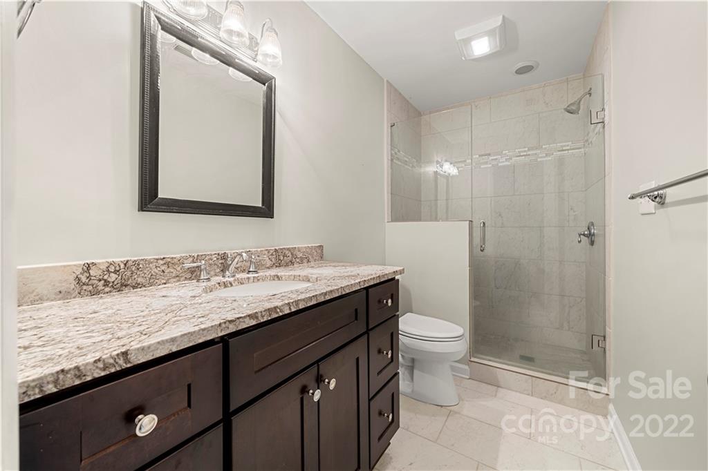 32 Old Post Road Clover, SC 29710 - Photo 20 of 45 a bathroom with a granite countertop sink toilet and shower