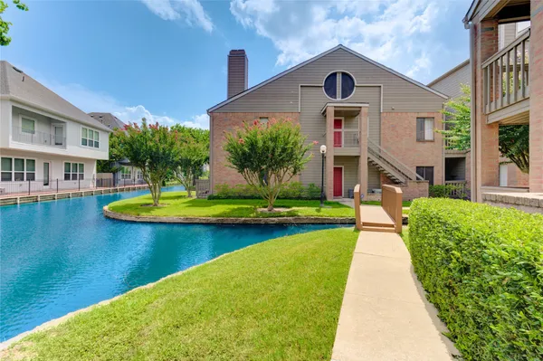 a front view of a house with swimming pool