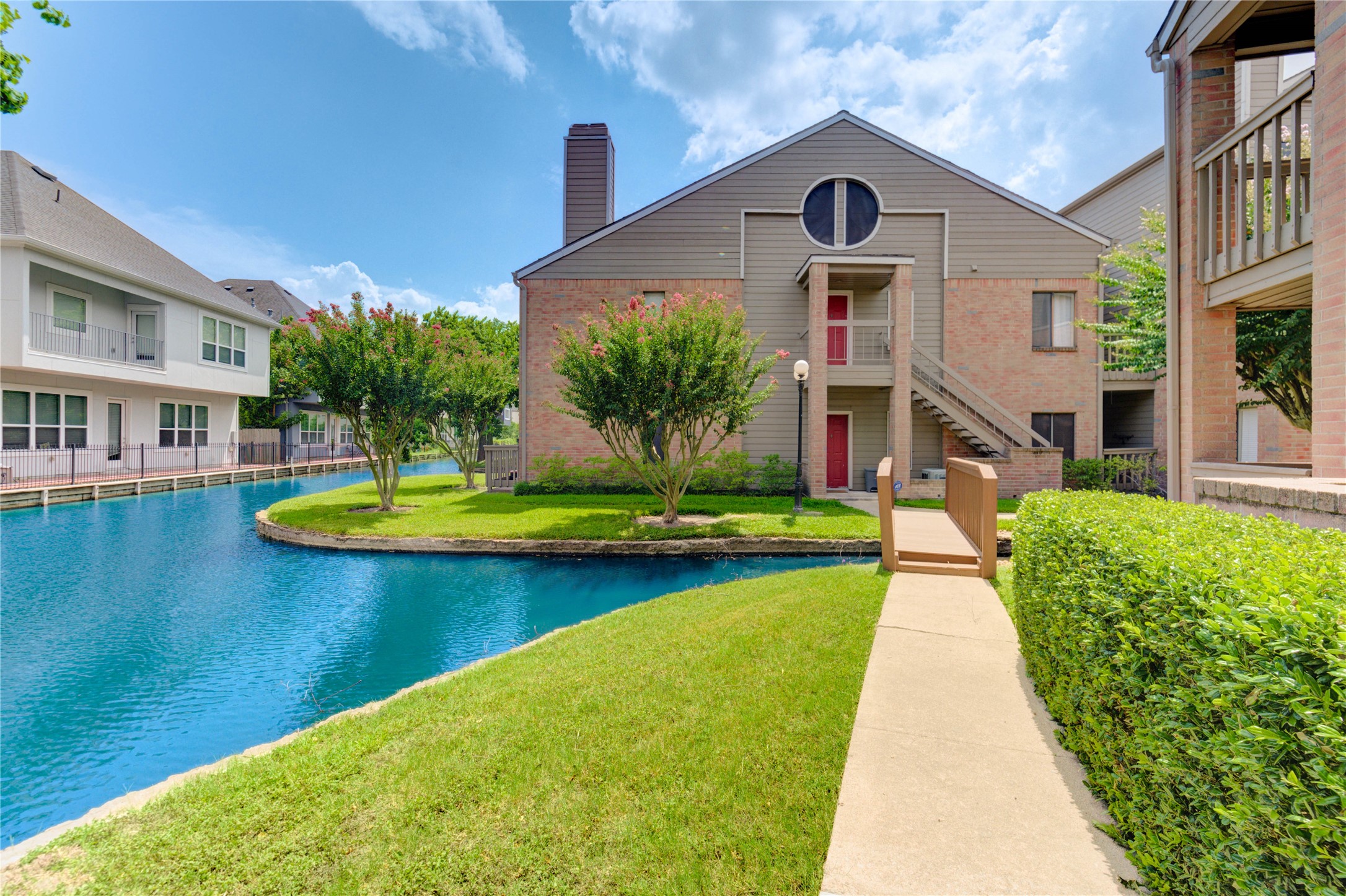 2023 Gentryside Drive, Unit 202 Houston, TX 77077 - Photo 13 of 50 a front view of a house with swimming pool