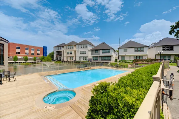 a view of a house with swimming pool