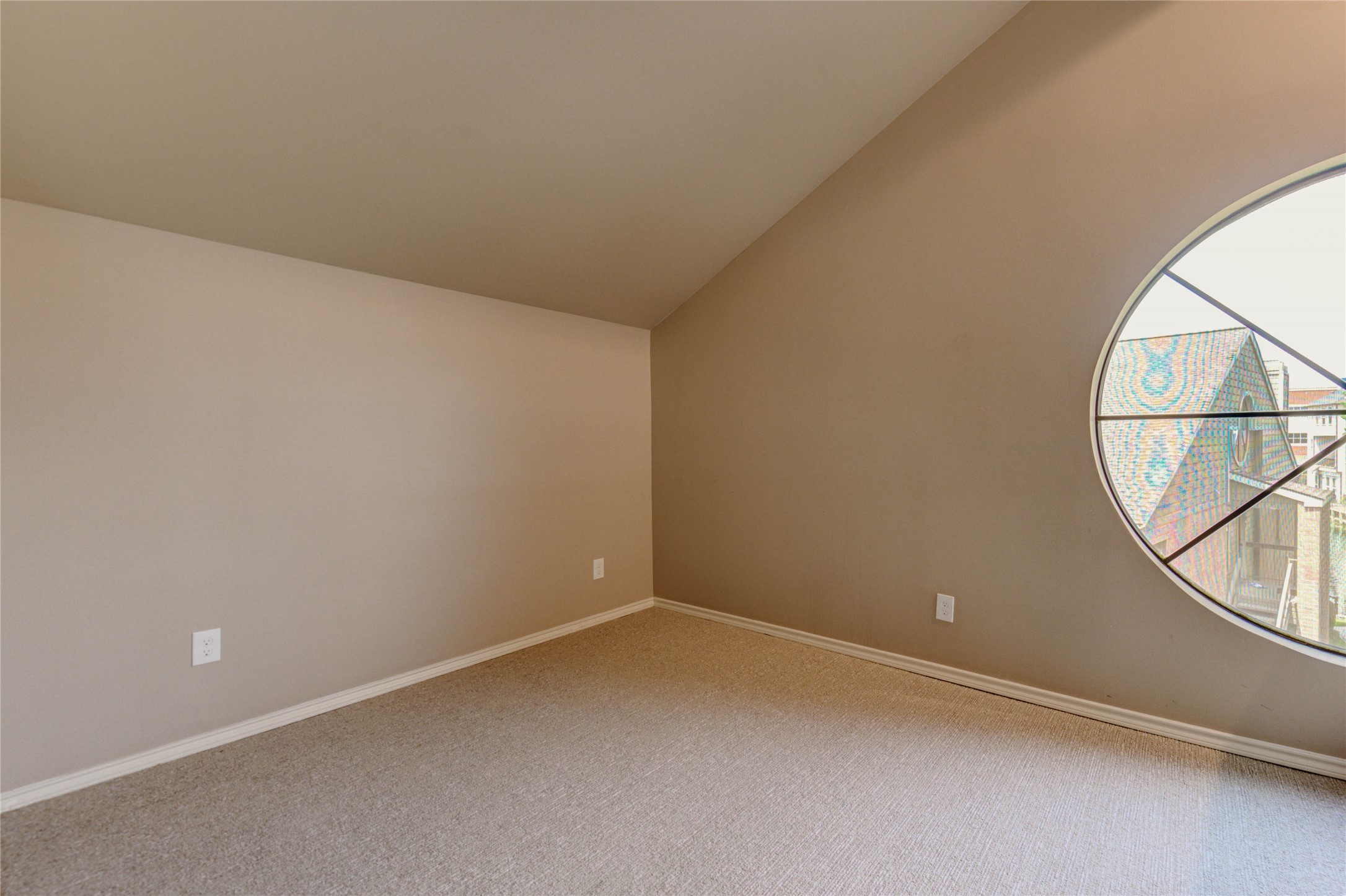 2023 Gentryside Drive, Unit 202 Houston, TX 77077 - Photo 46 of 50 an empty room with wooden floor and white walls