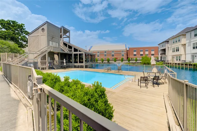 a front view of a house with swimming pool