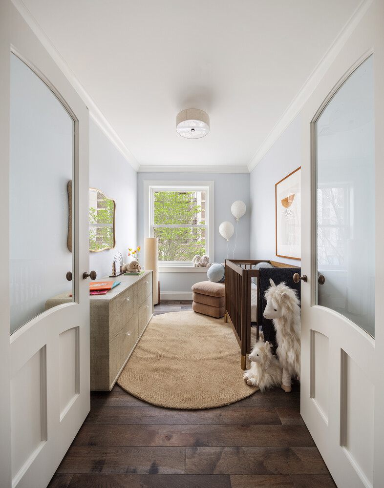1 Monroe Place Brooklyn, NY 11201 - Photo 22 of 31 a living room with furniture and a large window