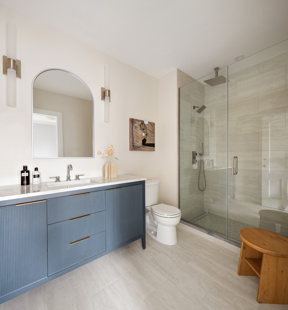 1 Monroe Place Brooklyn, NY 11201 - Photo 23 of 31 a bathroom with a double vanity sink toilet and shower