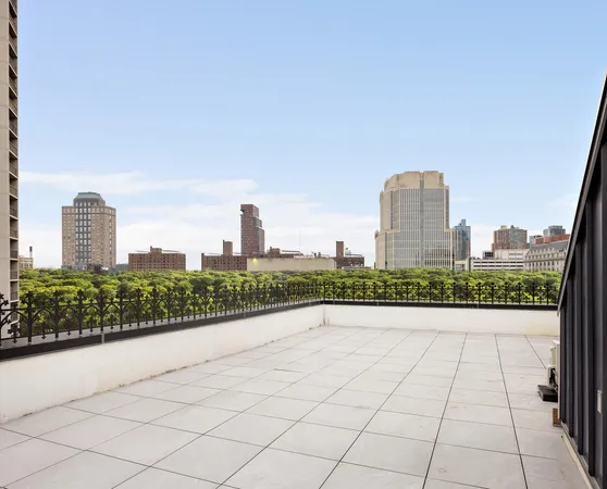 a view of a city with tall buildings