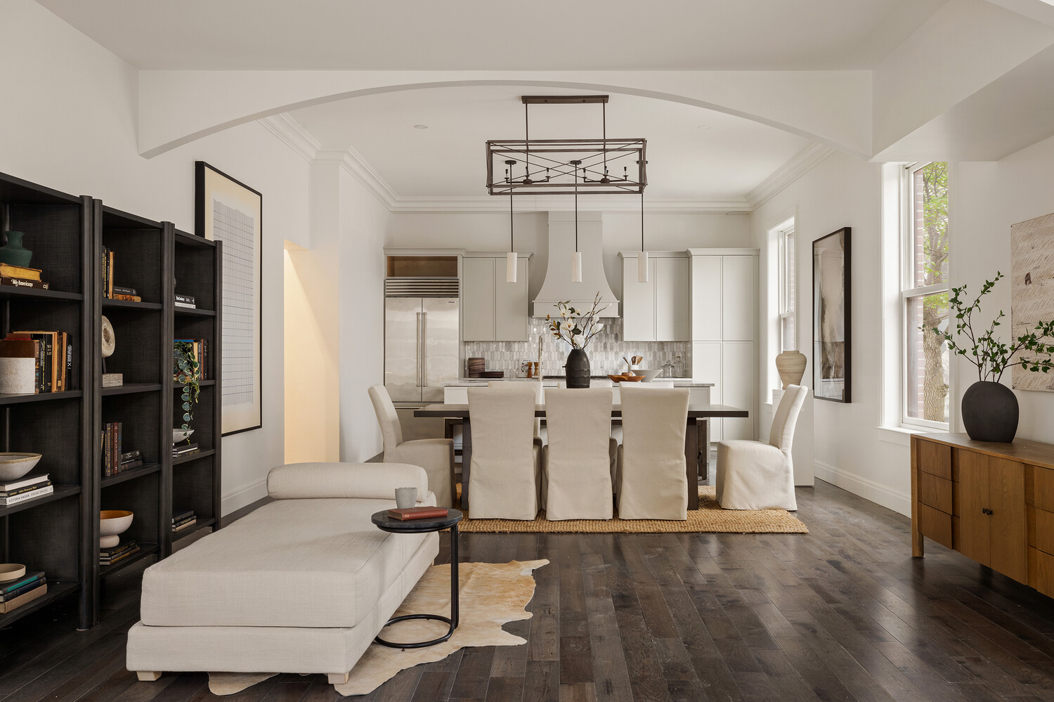 1 Monroe Place Brooklyn, NY 11201 - Photo 2 of 31 a living room with furniture and a book shelf